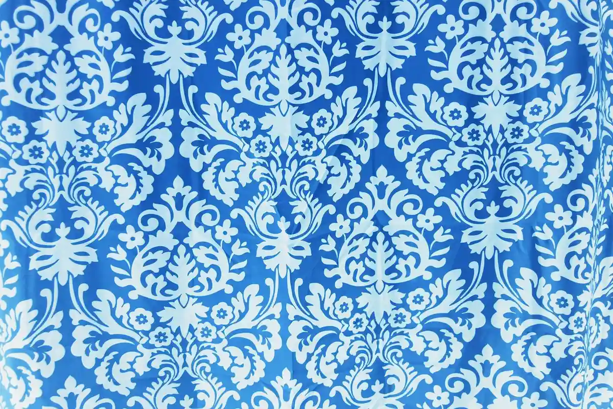 Blue and white damask fabric pattern