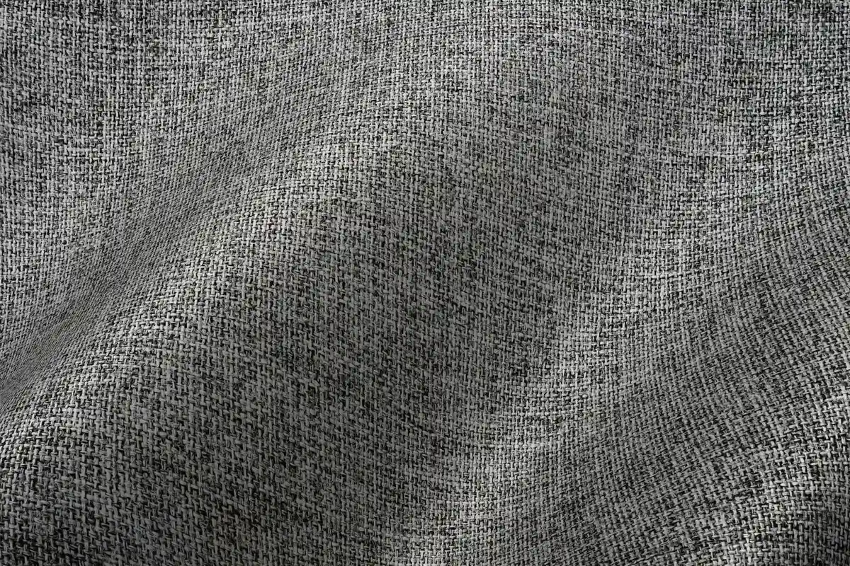 Close-up of gray woven fabric texture showing subtle grain and weave pattern.