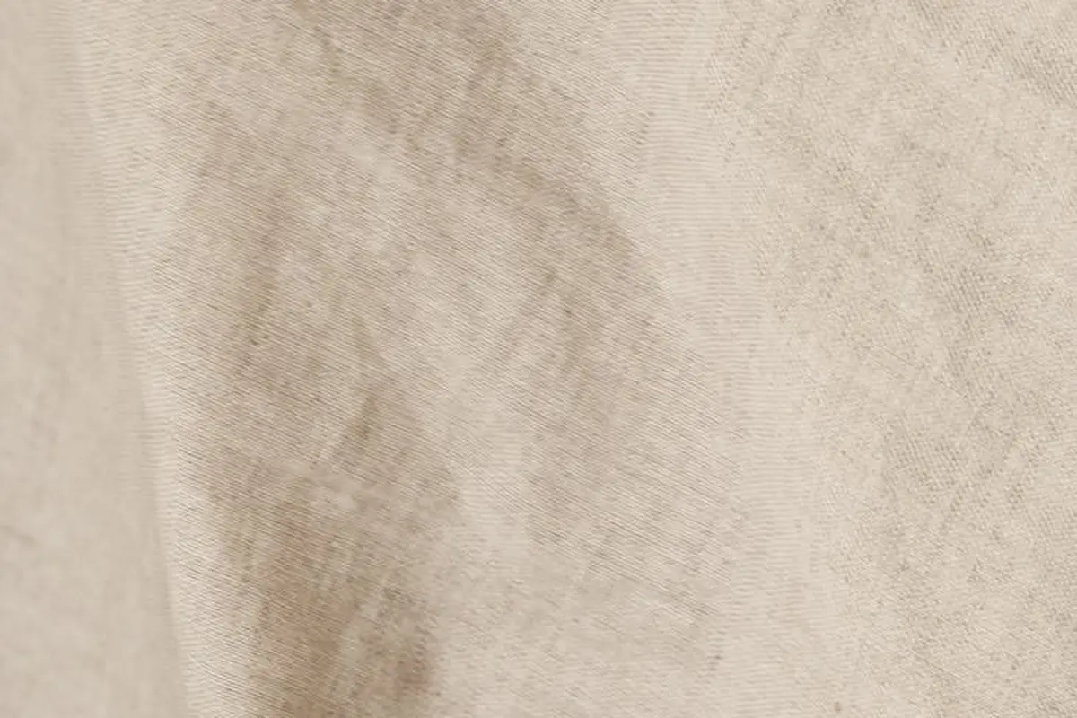 Close-up of beige linen fabric texture