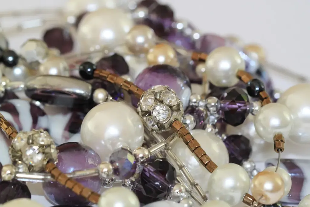 How Do You Attach Rhinestones and Gems to Fabric Securely?
