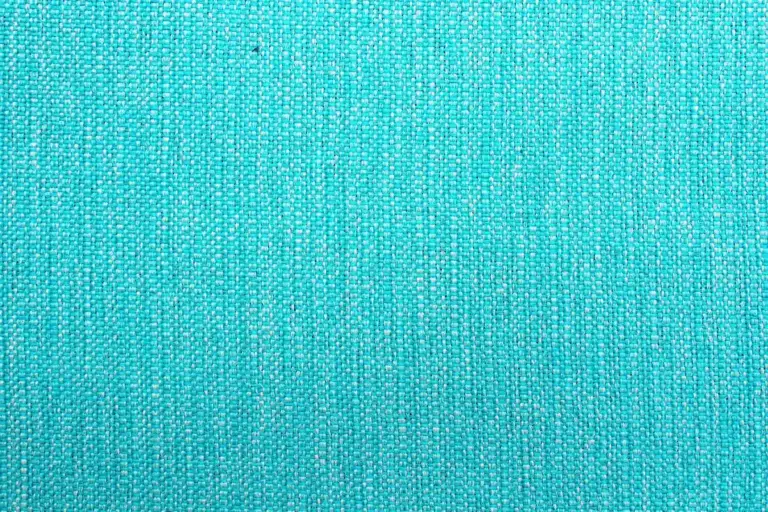 Close-up of teal woven fabric texture