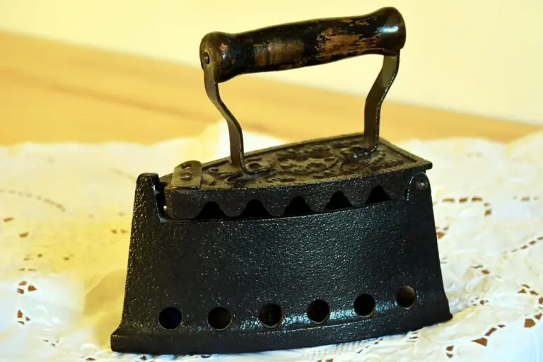 Vintage iron resting on a lace tablecloth